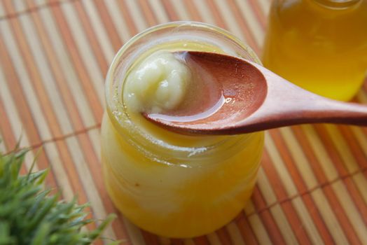 homemade ghee in container on a table