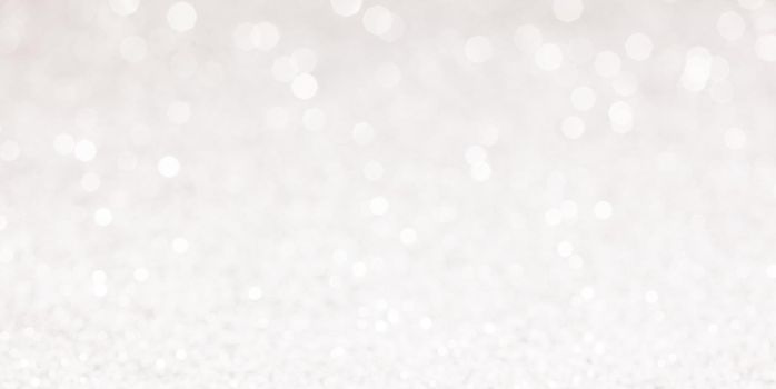 glitter silver background abstract banner, de-focused. Copy space.