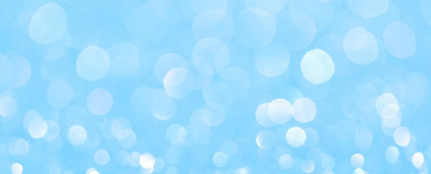 sparkles of Blue glitter abstract background. Copy space. banner