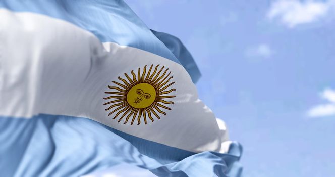 Detailed close up of the national flag of Argentina waving in the wind on a clear day. Democracy and politics. South american country. Selective focus.