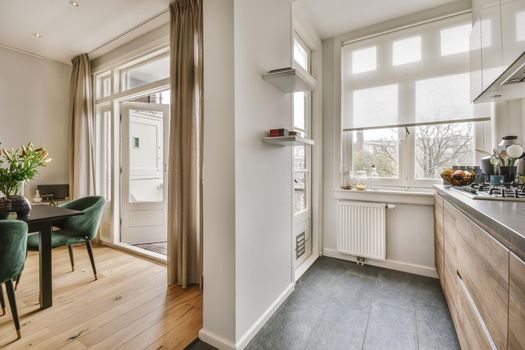 Cozy kitchen zone with in a spacious apartment