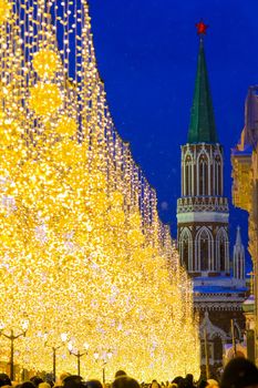 New Year in Moscow near Red Square. Decorated buildings and a tree with lights and garlands. Moscow, Russia January 5, 2019.