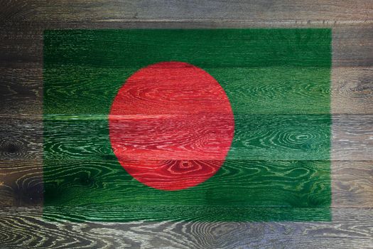 A Bangladesh flag on rustic old wood surface background