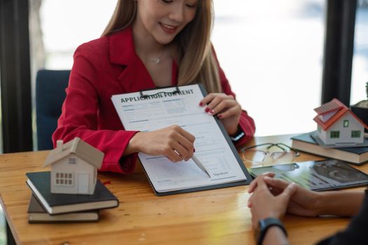 Client sign the documents to make the contract legally, Home sales and home rental real estate concept.