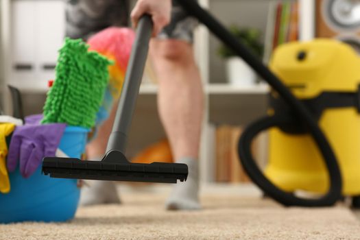 Proper vacuuming of carpets. House cleaning and cleaning services concept