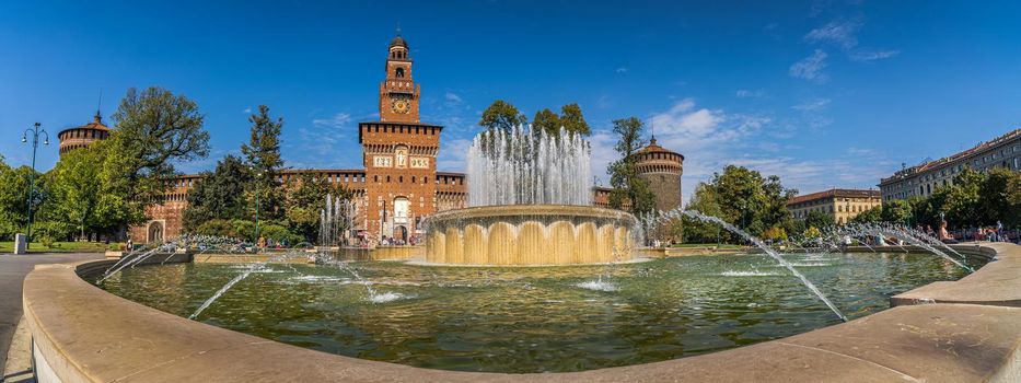 Panoramic view of Castello Sforzesco square with fountain in Milan, Italy.