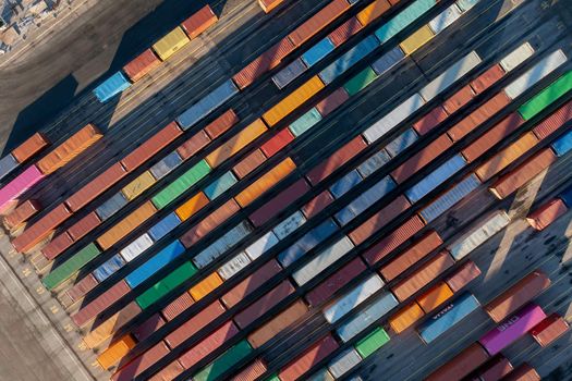 Copenhagen, Denmark - January 06, 2022: Aerial top down view of multi colored containers at Copenhagen Malmo Port.