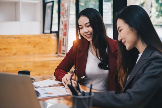 Business woman or accountant making working audit with her team. finance and accounting concept