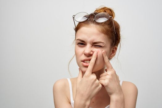 woman with a pimple on the face hygiene treatment. High quality photo