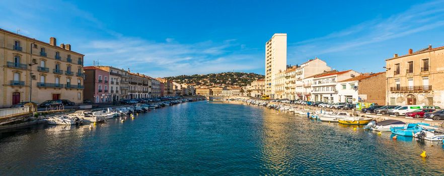 Sète is an important port city in the south-east of France, located in Occitanie. It is bordered by the Thau lagoon, a saltwater lagoon which is home to various animal species. Along a narrow isthmus, the Mediterranean coast of Sète is made up of sandy beaches.