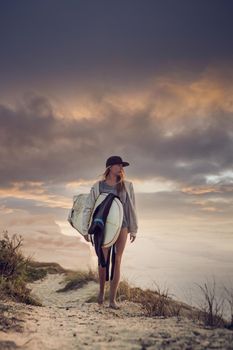 A beautiful girl after a great surf session