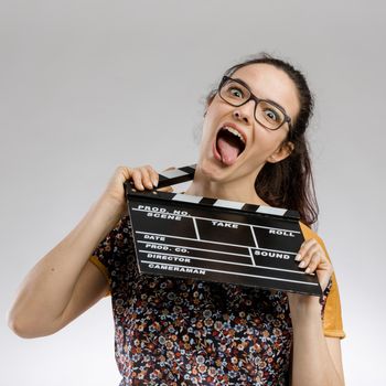 Crazy woman hanging with a clapboard