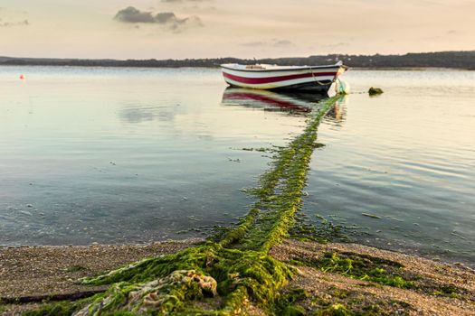 Beautiful old fishing boats resting on the lake