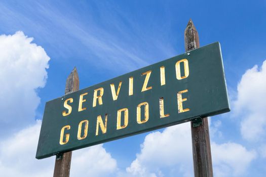 Sign of Gondola service in Venice. Entering point. Italian translation: Gondola service. Venice, ITALY - July 22, 2020.