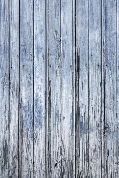 Old wooden light blue painted surface. Light blue old wood planks background.