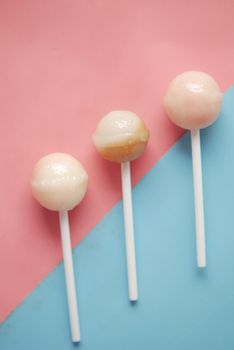 top view of lollipop candy on color background .