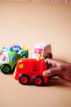 colorful plastic toys on blue background .