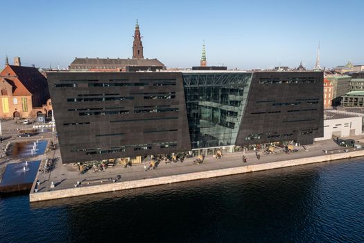 Copenhagen, Denmark - January 14, 2022: Aerial drone view of The Royal Library, also know as the Black Diamond