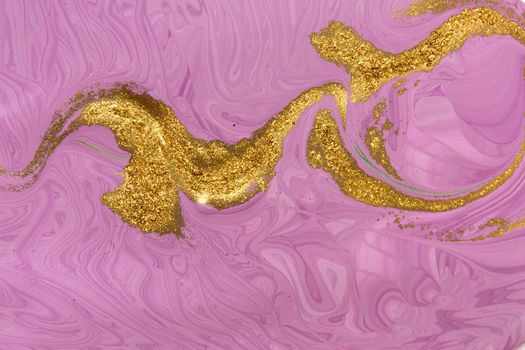 Gold dust pattern on flow purple paints background. Abstract print.