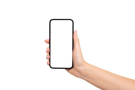 Woman hand holding smartphone with blank screen isolated on white background. Mobile phone mockup. High quality photo