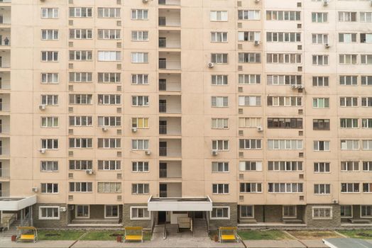 Facade of a modern multi storey residential complex. Urban architecture