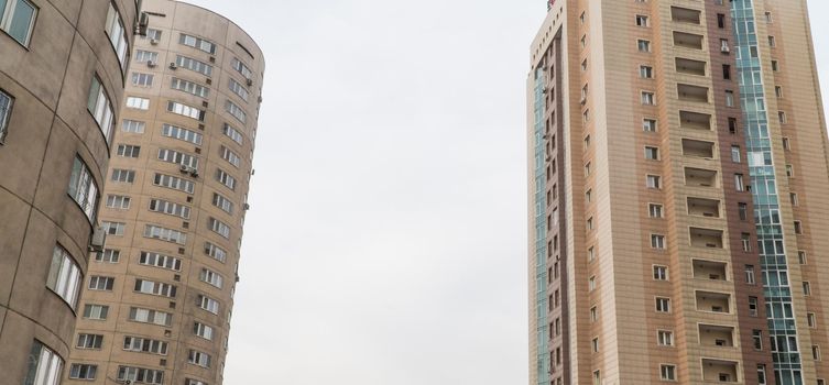 Multi storey residential complex against the sky. Urban architecture