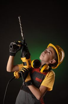 the child the Builder costume posing with a work tool