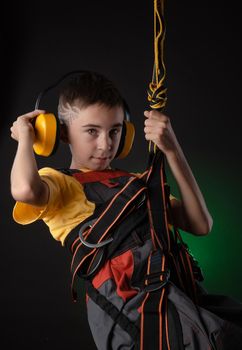 the child the Builder costume posing with a work tool