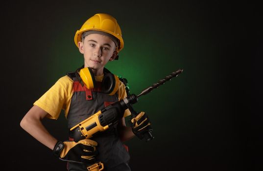 the child the Builder costume posing with a work tool