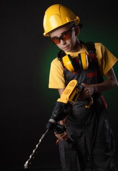 child the Builder costume posing with a work tool