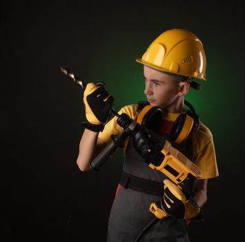 the child the Builder costume posing with a work tool