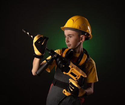 the child the Builder costume posing with a work tool