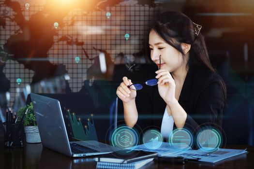 Investment concepts, businesswomen use computers to analyze stock markets, quantitative data collection, financial statement analysis, profitability through internet technology