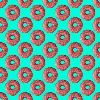 seamless donut pattern with a shadow on a turquoise background. High quality photo