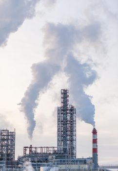 Petrochemical industrial factory of heavy industry, power refinery production with smoke pollution.Thick smoke is coming from the factory's chimney. smoke smog emissions bad ecology aerial photography