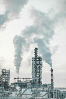 Petrochemical industrial factory of heavy industry, power refinery production with smoke pollution.Thick smoke is coming from the factory's chimney. smoke smog emissions bad ecology aerial photography