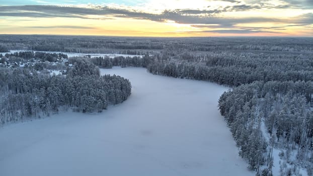 Beautiful winter sky and frozen lake in Russia. High quality photo