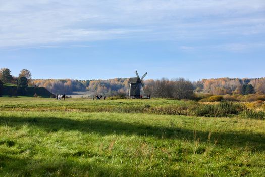 Awesome windmill standing in the field. High quality photo