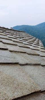 traditional roof of the Alpi piode beole made with Gneiss rock. High quality photo
