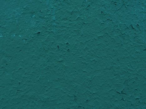 Green wall old paint stucco texture background. Green plaster wall texture.