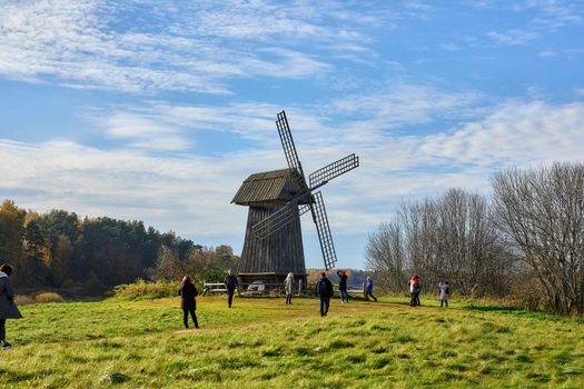 Awesome windmill standing in the field. High quality photo