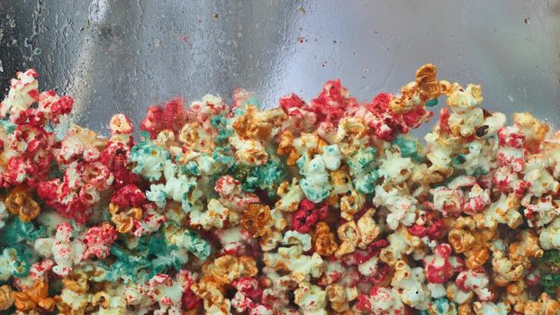 Colored and delicious fried popcorn on the street