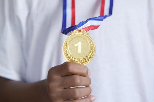 First Place Throphy against yellow background.