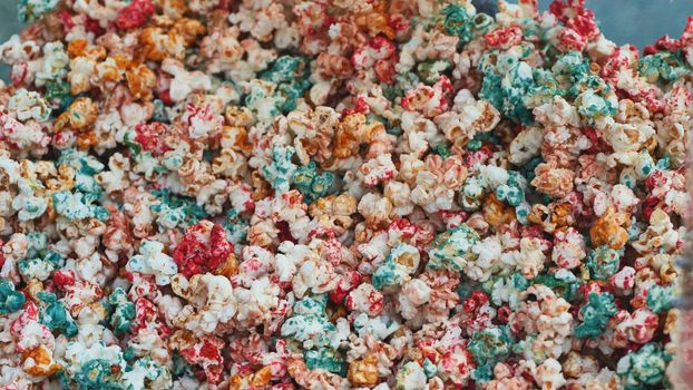 Colored and delicious fried popcorn on the street
