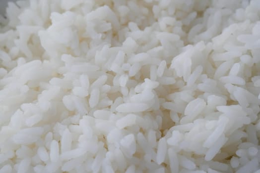 cooked rice in a bowl on table, close up
