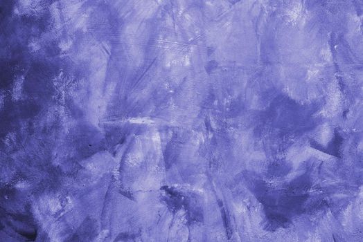 Smears of lilac paint on the wall. Concrete designer wall color 2022. Fashionable very peri color of the spring-summer 2022 season from New York Fashion Week.