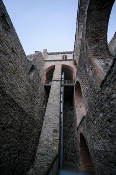 Sacra di San Michele in Turin, view from below of the cliff and walls. High quality photo