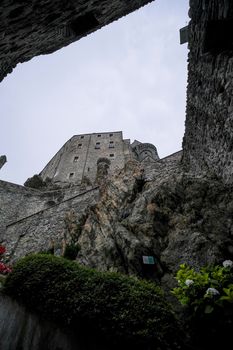 Sacra di San Michele in Turin, view from below of the cliff and walls. High quality photo