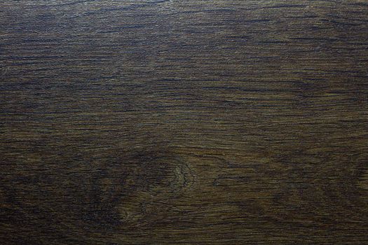 Wood texture. Wooden board close up. The cracks are deep. Laminate flooring. Tree rings in a cut.