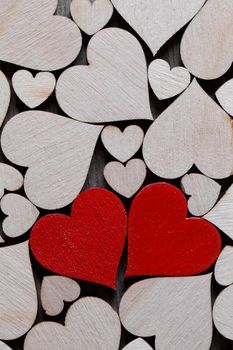 True love, two color red hearts on colorless wooden hearts background, special ones concept for Valentines day